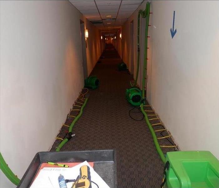SERVPRO equipment drying insides of walls