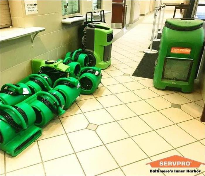 SERVPRO equipment organized in the room of a business