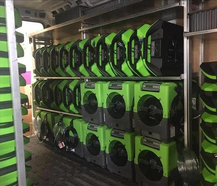 A rack of industrial fans