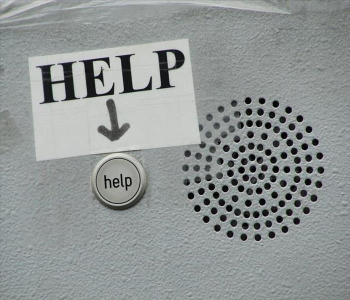 A button with the word "help" on it